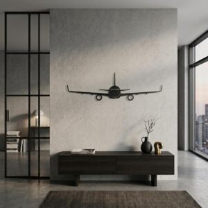 Czarna metalowa dekoracja ścienna 3D z motywem samolotu Airbus A320 zawieszona nad szafką w loftowym salonie